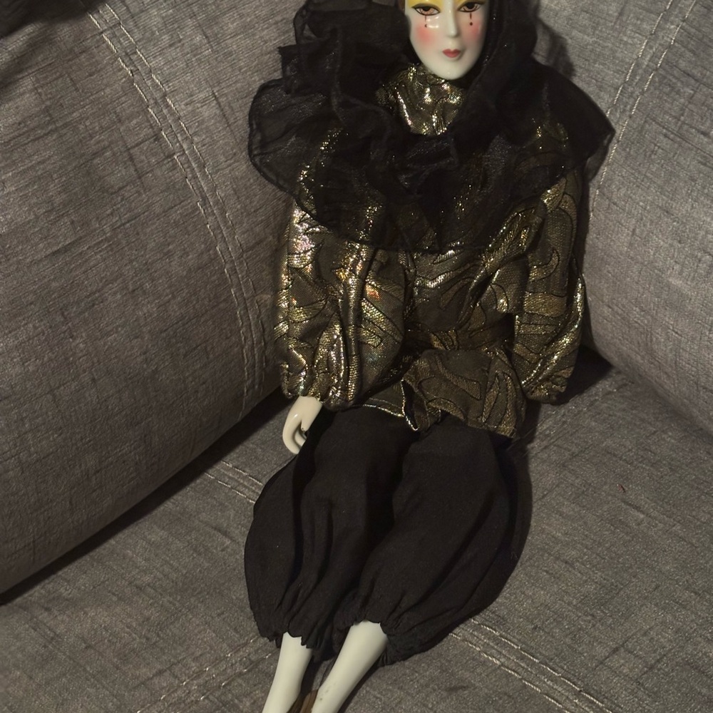 Elegant Harlequin Doll in Gold and Black Ensemble